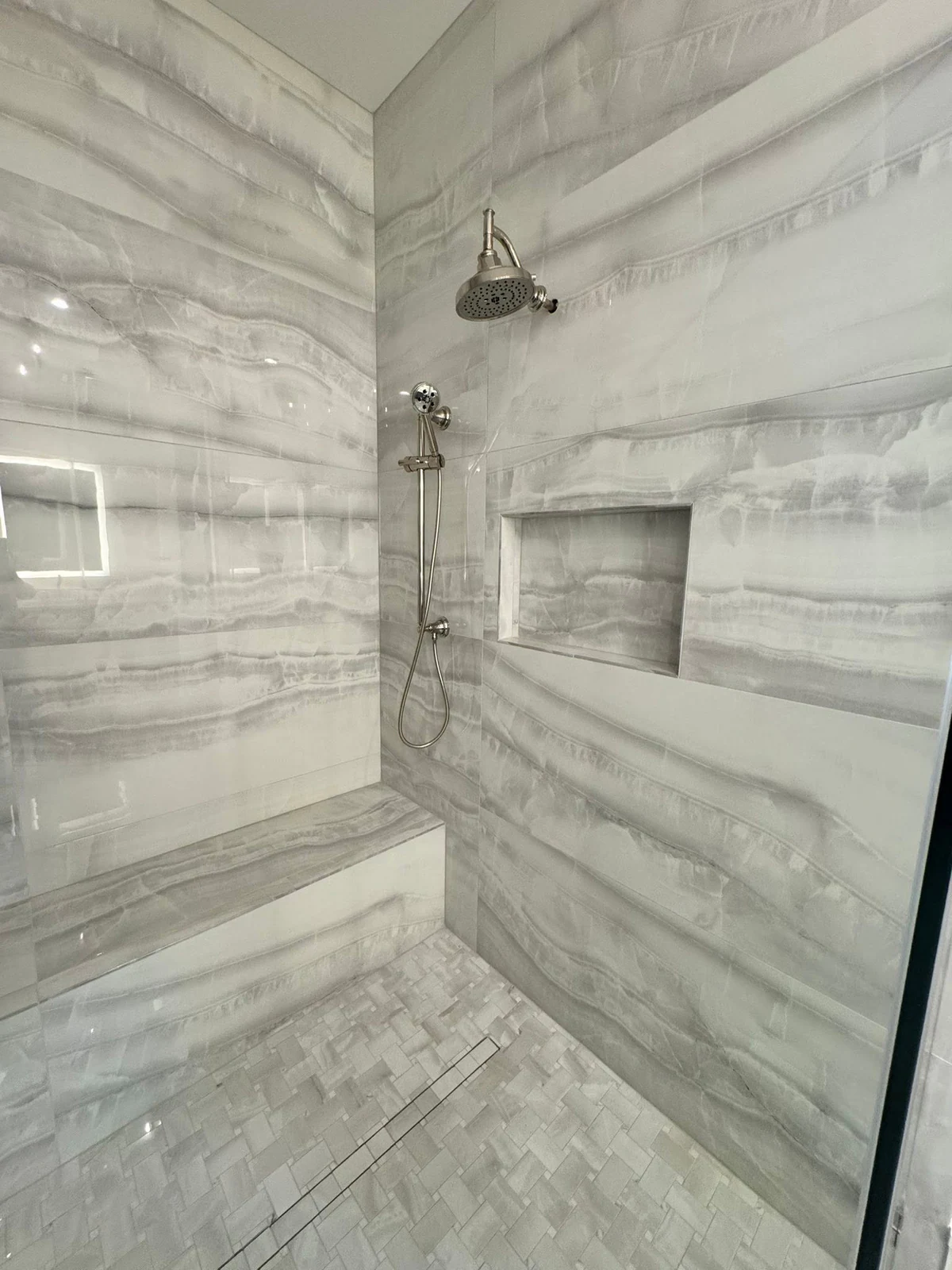 Master bathroom tile work by Paez And More